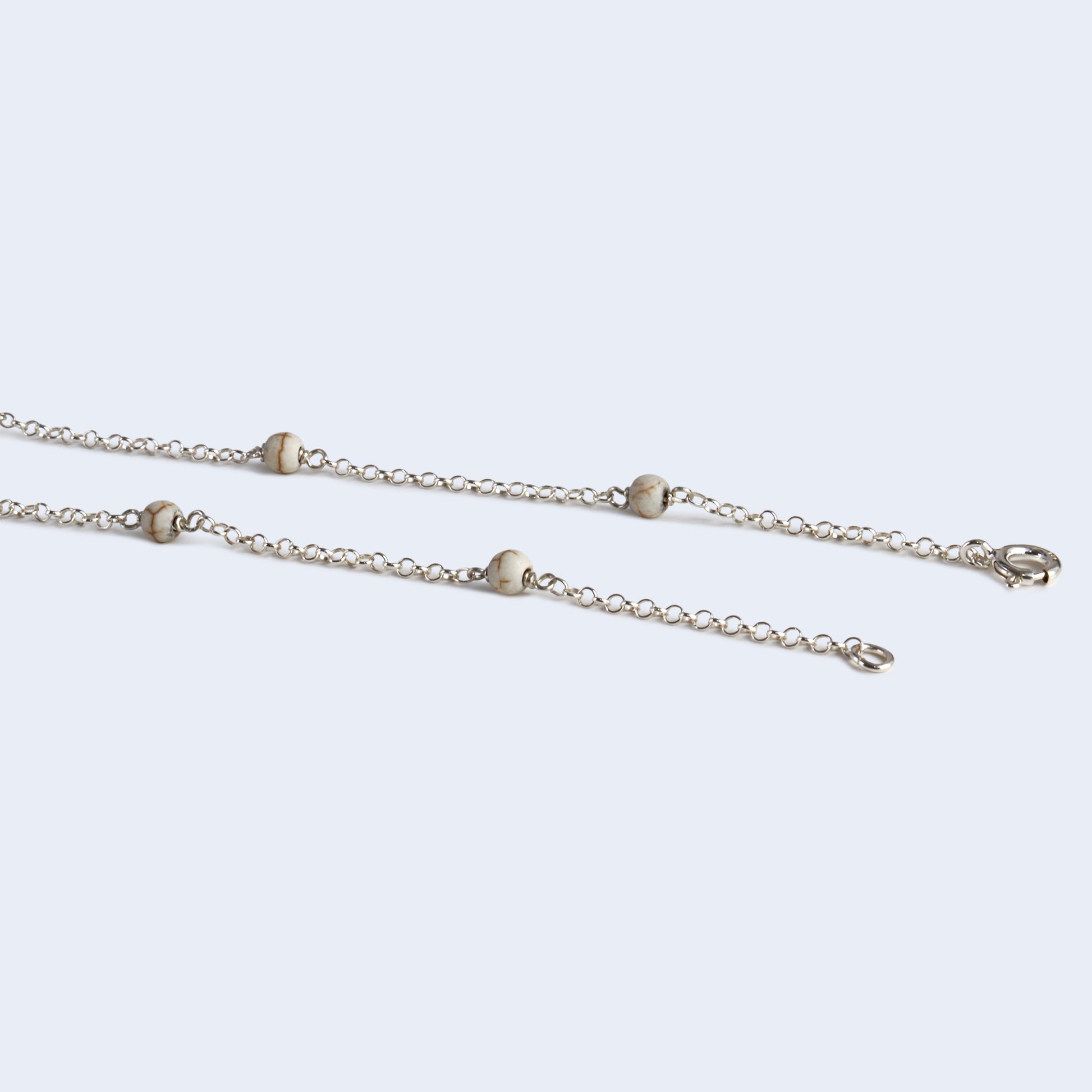 Sterling silver station necklace.