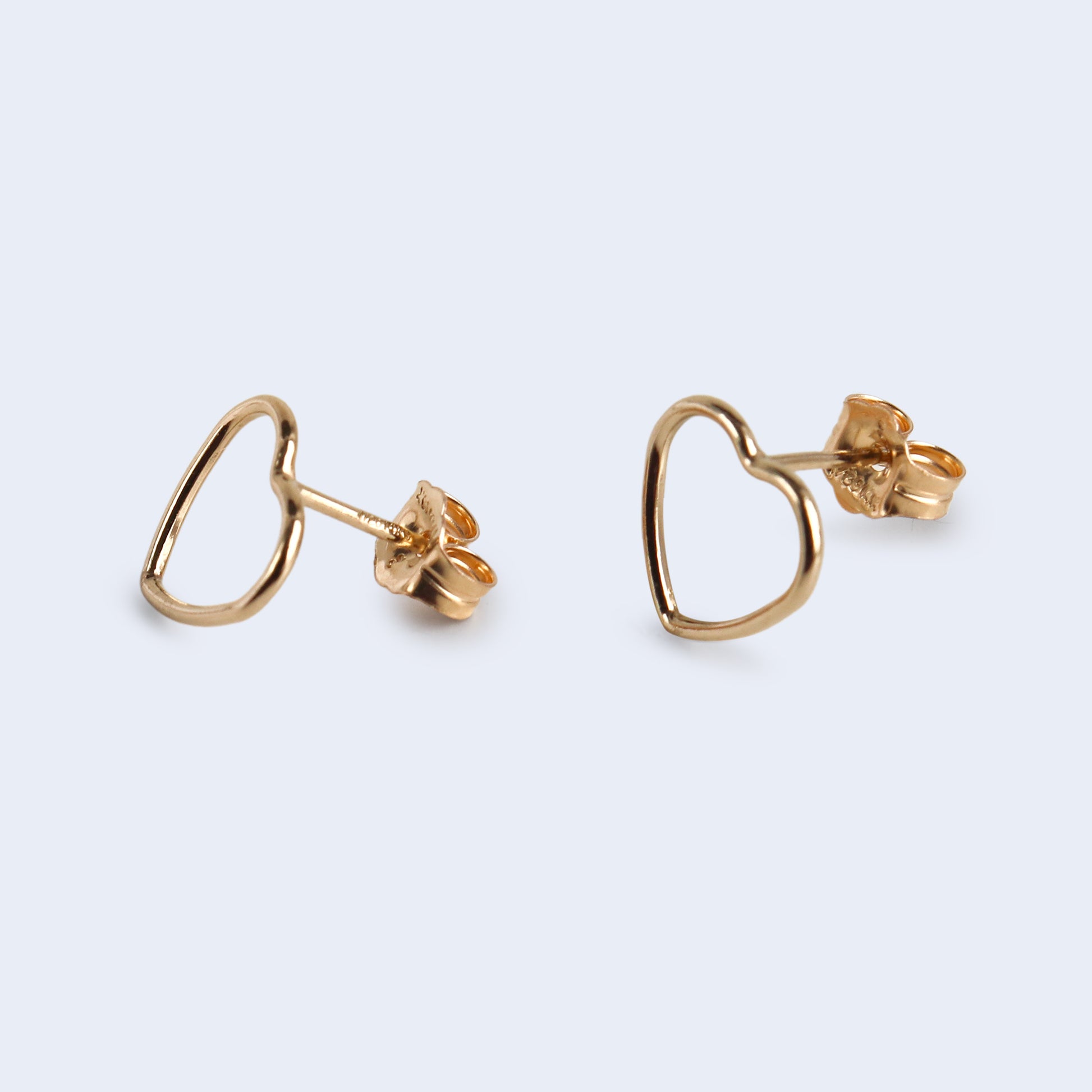 Gold heart earrings.