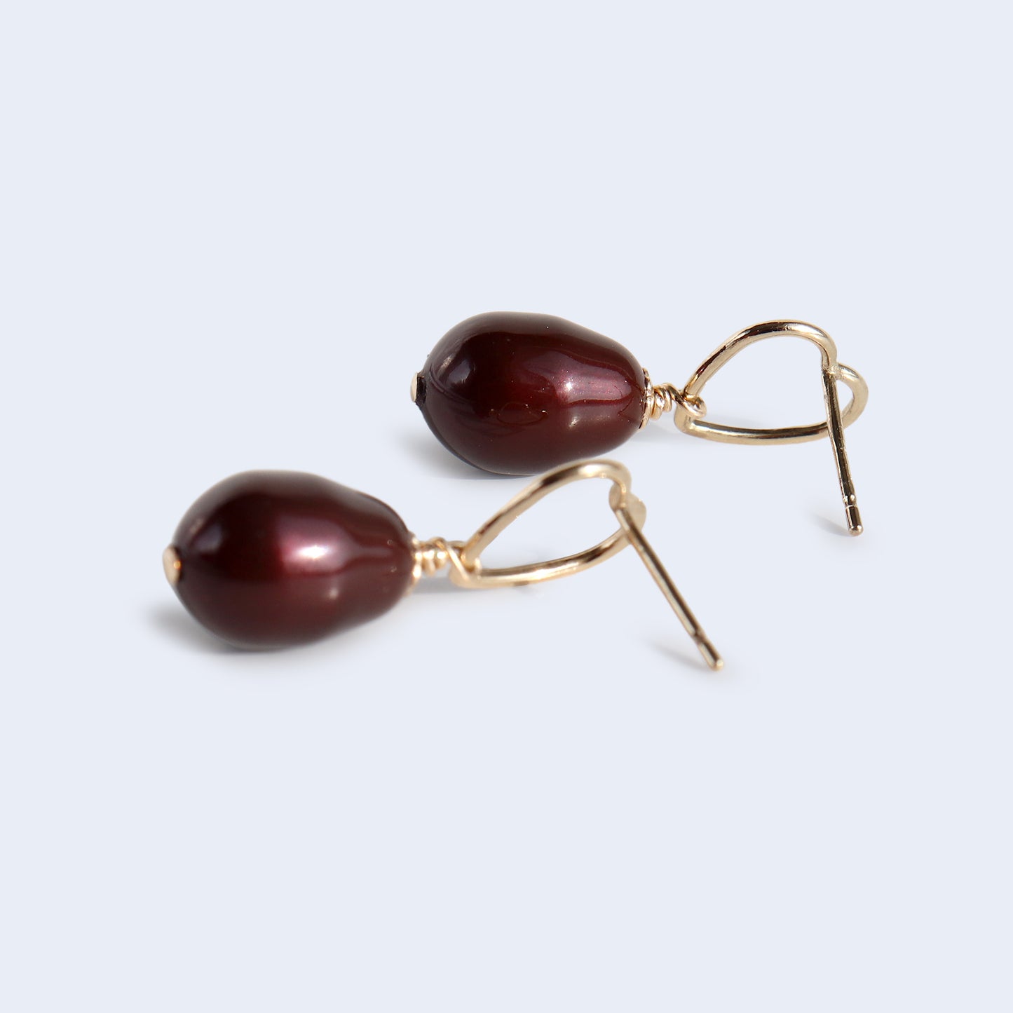 Heart shape drop earrings with Swarovski maroon pearl