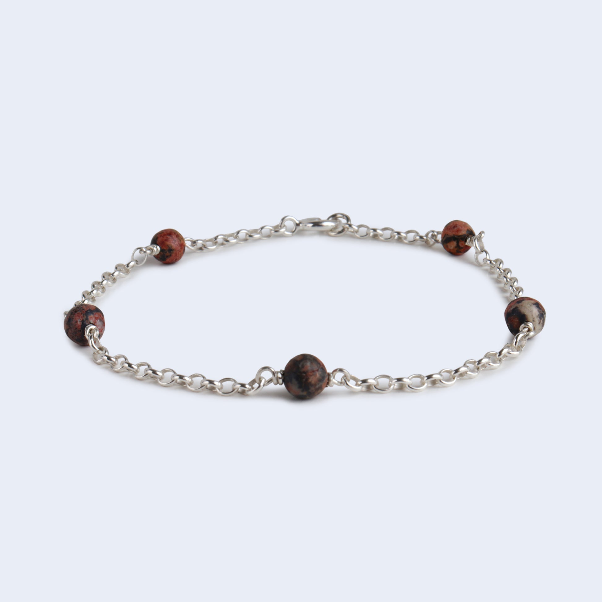 Sterling Silver chain bracelet with gemstones.