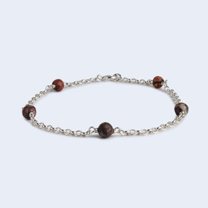 Sterling Silver chain bracelet with gemstones.