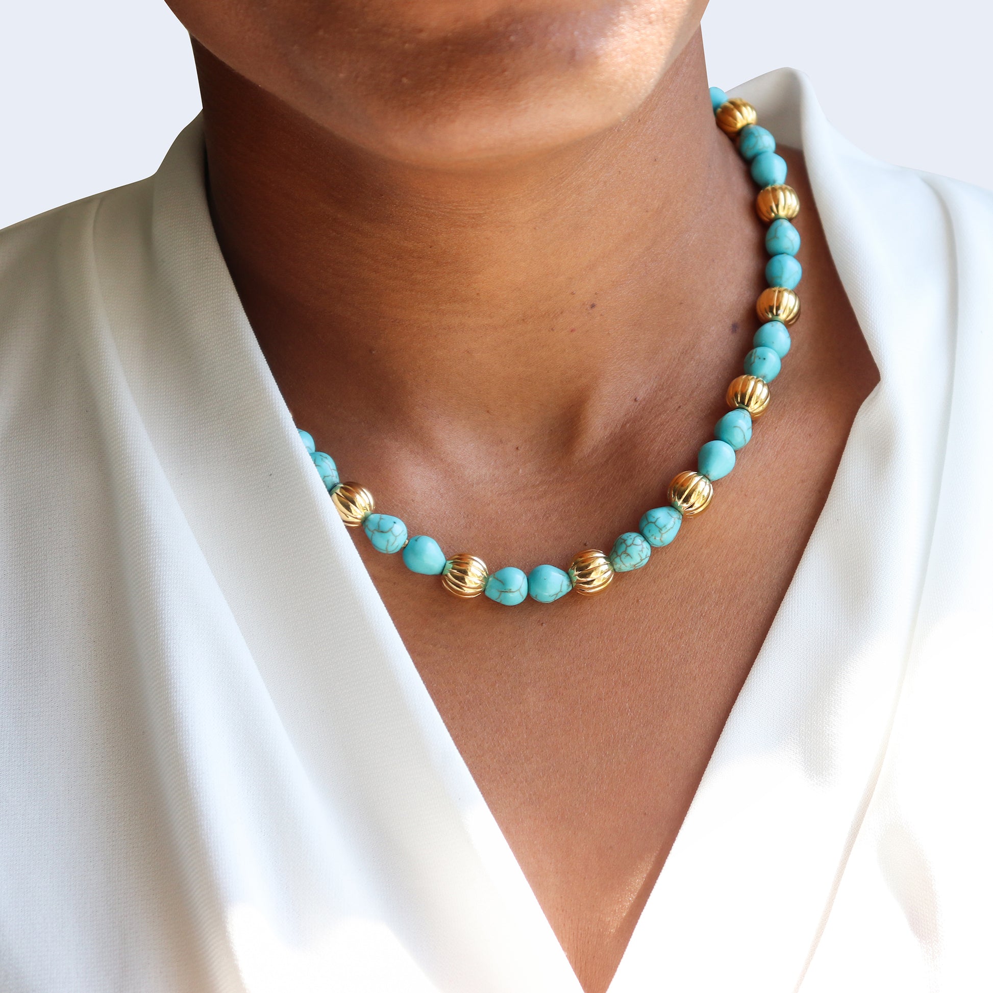 Statement gemstone necklace.